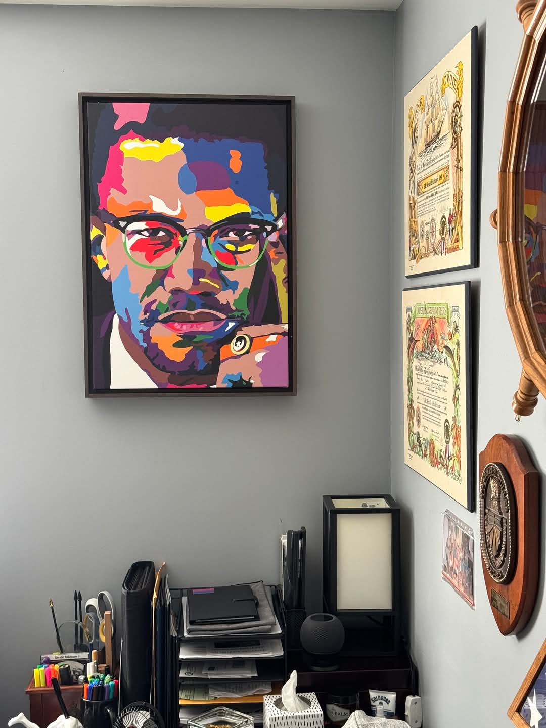 By Any Means Malcolm X original painting by Vakseen displayed in a contemporary interior